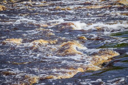 Sablinsky waterfalls. Little waterfall. The brown water of the waterfall. Waterfalls of Russia. Thresholds on the river. Strong water flow. Jets of water. Fast currentの写真素材