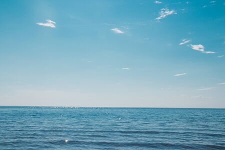 Sea in clear weather. Sea on a sunny day. Summer The Gulf of Finland. Small waves. Sea and beach. Background sea and sky blue.の写真素材