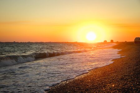 Sea waves. Sea of Crimea. High waves at sunset. Sunny day at sea. Background blue waves. Sand beach. Clean beach. Sea without people.の写真素材