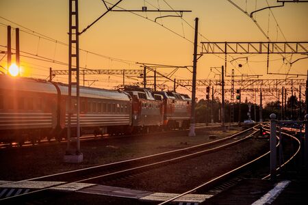 Summer railway of Russia. The iron path. Sunset on the train .Summer evening. Journey. Transport....