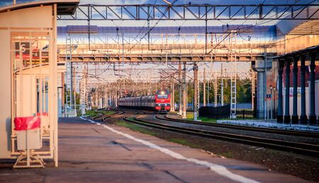 Summer railway of Russia. The iron path. Sunset on the train .Summer evening. Journey. Transport. Russia, Lyuban 15 August 2019のeditorial素材