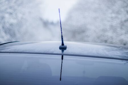 Car in winter in nature outside the city.の写真素材