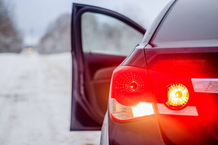 Car in winter in nature outside the city.の写真素材