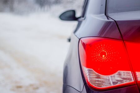 Car in winter in nature outside the city.の写真素材