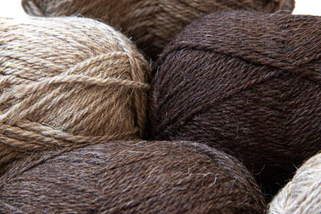 Wool yarns for knitting. Wool thread for knitting. Own hand. Knitting and needlework. Yarns for a...