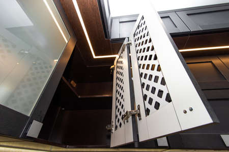 Modern kitchen made of solid black. The kitchen is of solid oak. details. Modern kitchen furniture filling. Furniture to order. The design of the apartment. The black kitchen. Furniture. Russia, Saint Petersburg, new building, April 15, 2020のeditorial素材