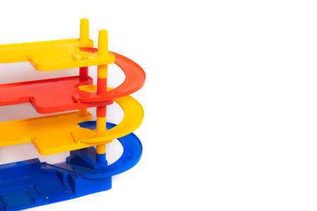 Game for small boys car parking on a white background. Game for boys. Plastic games. Off-street Parking. Article about games for boysの写真素材