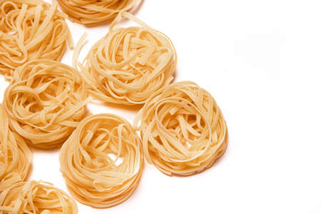 Macaroni nest isolate. Macaroni on a white background. Article about nests pasta dishes. Pasta...