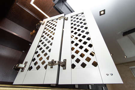 Modern kitchen made of solid black. The kitchen is of solid oak. details. Modern kitchen furniture filling. Furniture to order. The design of the apartment. The black kitchen. Furniture. Russia, Saint Petersburg, new building, April 15, 2020のeditorial素材