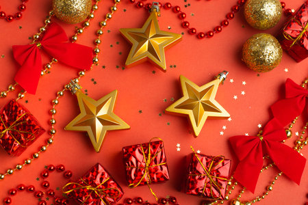 New Year's layout on a red background with balloons. New Year and Christmas copy space. ... Festive decoration. Christmas ballsの写真素材