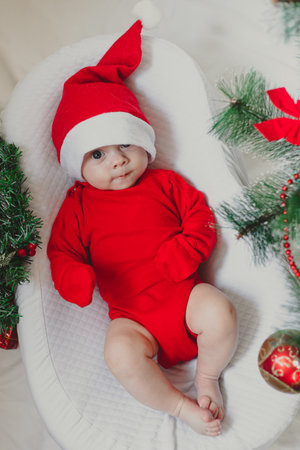 Baby in a cocoon new year. An article about the new year. An article about children. The first new...