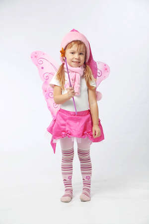 Portrait of sweet little girl in Christmas fairy costumeの写真素材