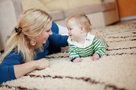 Mother with her baby at home