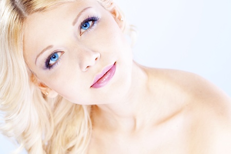 Portrait of young beautiful blond woman with fashion make-up and hairstyleの写真素材