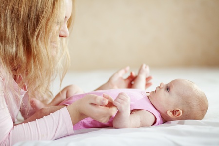Portrait of a mother with her newborn babyの写真素材