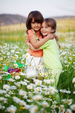 Portrait of little friends huggingの写真素材