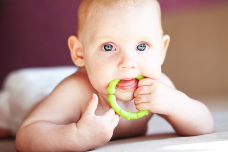 Picture of a baby lying in bed