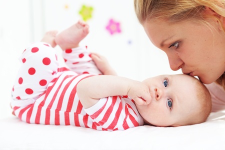 Portrait of a mother with her little babyの写真素材