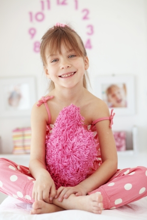 Casual portrait of cute child in her nurseryの写真素材