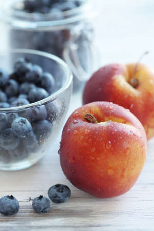 Lot of fruits and berries on a wooden backgroundの写真素材