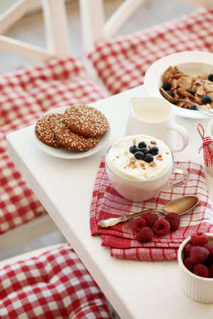 Breakfast with summer berries and cereal breadの写真素材