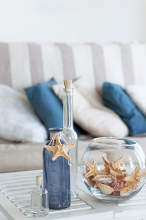 Idea of interior decoration with starfishes and glass bottlesの写真素材