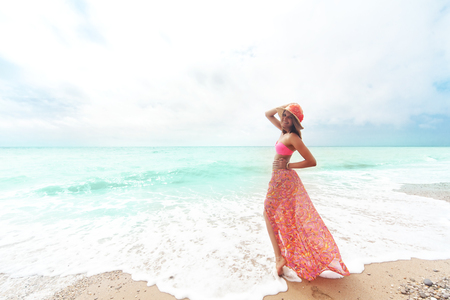 Portrait of beautiful girl having fun on the beachの写真素材