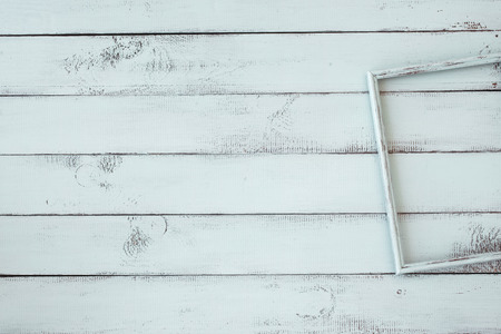 Wooden photo frame on mint shabby chic backgroundの写真素材