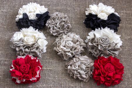 Beautiful letter N made of handmade flowers on a linen canvasの写真素材