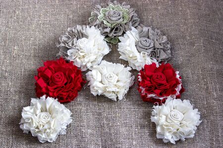 Beautiful letter A made of handmade flowers on a linen canvasの写真素材