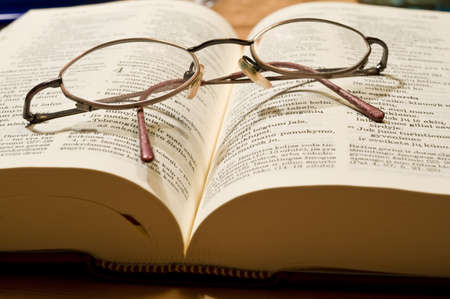 Bible book in the Swedish languageand glasses taken as macroの写真素材