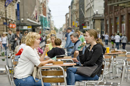 Couple eats ice cream in street cafe Helsinki, Finlandのeditorial素材