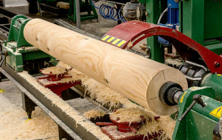 Log on the woodworking machineの写真素材