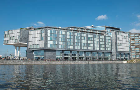 Amsterdam, The Netherlands - April 05, 2014; DoubleTree by Hilton Hotel in Amsterdam is combines elegant modern rooms, business facilities with the latest A/V technology, a fitness centre and an ideal location overlooking the water.のeditorial素材