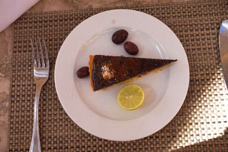 lemon chocolate cake on a plate with chocolate