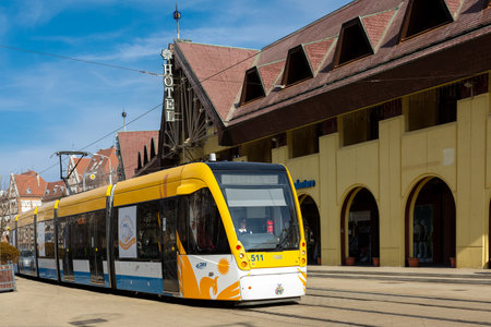 Debrecen, Hungary. March 02, 2019. Modern yellow tram at the street in historical center of Debrecen, Hungaryのeditorial素材