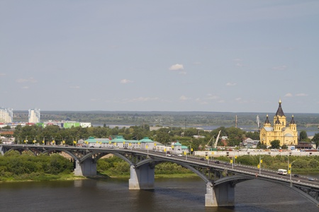 View of the bridge across the Oka River and Alexander Nevsky Cathedral in Nizhny Novgorodの写真素材