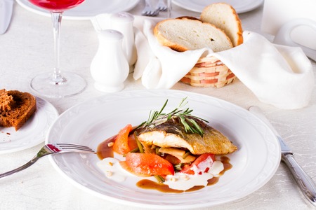 Fried carp and tomatoes blanche