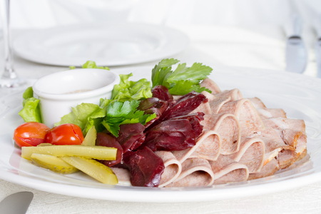 Plate with several kinds of meatの写真素材