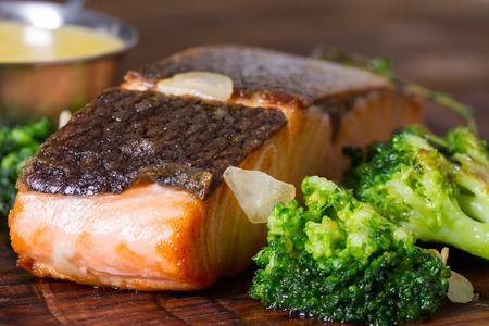 Grilled salmon steak and broccoliの写真素材