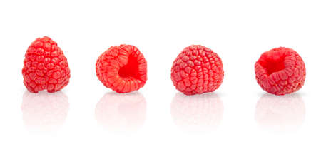 Juicy raspberries on a white isolated background