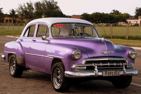 Havana, Cuba, July 18, 2017. A classic american car as a taxi it is one of the few private businesses allowed on the island.のeditorial素材