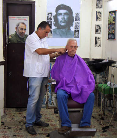 Havana, Cuba, July 17, 2017. As in this barber shop, the icons of the revolution are present in every corner of old Havanaのeditorial素材