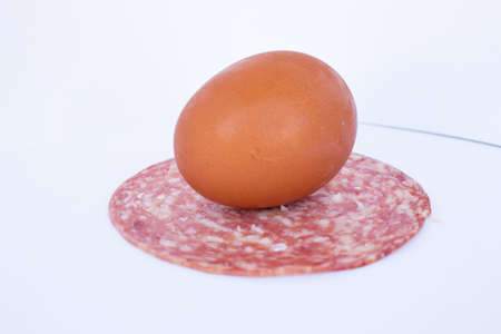 egg and salami sliced compositionの写真素材