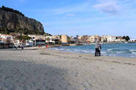couple kisses on the beach, sicily, palermoの写真素材
