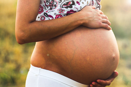 Pregnant woman's bellyの写真素材