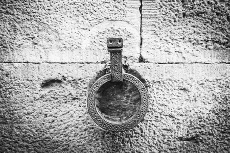 Iron Ring in the wall - Black and whiteの写真素材