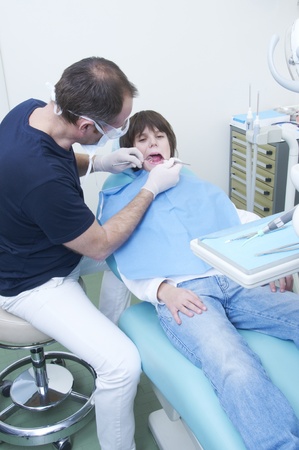 boy during a dental visit. doctor's clinicの写真素材