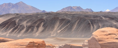 volcanic stones and sand dunes.の写真素材