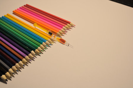 Telephone receiver on orange background with smoke. Close-up view.の写真素材